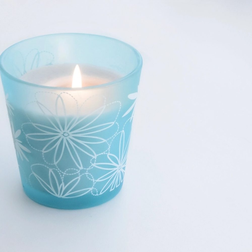 A frosted glass candle
